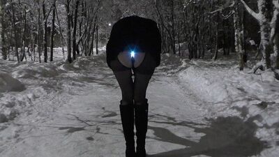 Public winter walk backlit in the ass